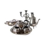 A large collection of silver plated items, including a twin handled tray, two other trays, two tea