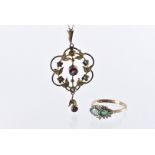 An Edwardian 9ct gold garnet and seed pearl pendant on chain, 3g, together with a 9ct gold emerald