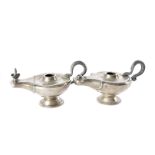 A pair of George VI silver presentation table lighters from Mappin & Webb, the Roman style oil lamps