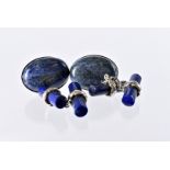 Two modern pairs of lapis lazuli cufflinks, one with cylinders of blue hardstone with silver