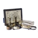 A collection of Victorian and later silver items, including an Art Deco cigarette box, three