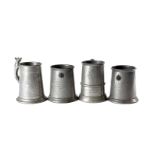 A large collection of presentation and other pewter tankards, some with glass bases, various