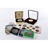 A collection of crowns and coins, including a cased silver proof 1980 crown, a 1970 proof set,