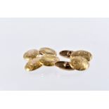 Two antique pairs of gold cufflinks, one pair 15ct with floral engraved oval panels and single