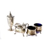 Four Victorian and later silver cruet items, including a pair of trench salts with blue glass