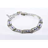 An Arts & Crafts silver and enamelled bracelet by Murrle Bennett & Co, rectangular pierced links