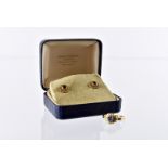 A modern 18ct gold sapphire and diamond ring and earrings set, having a cabochon blue stone and