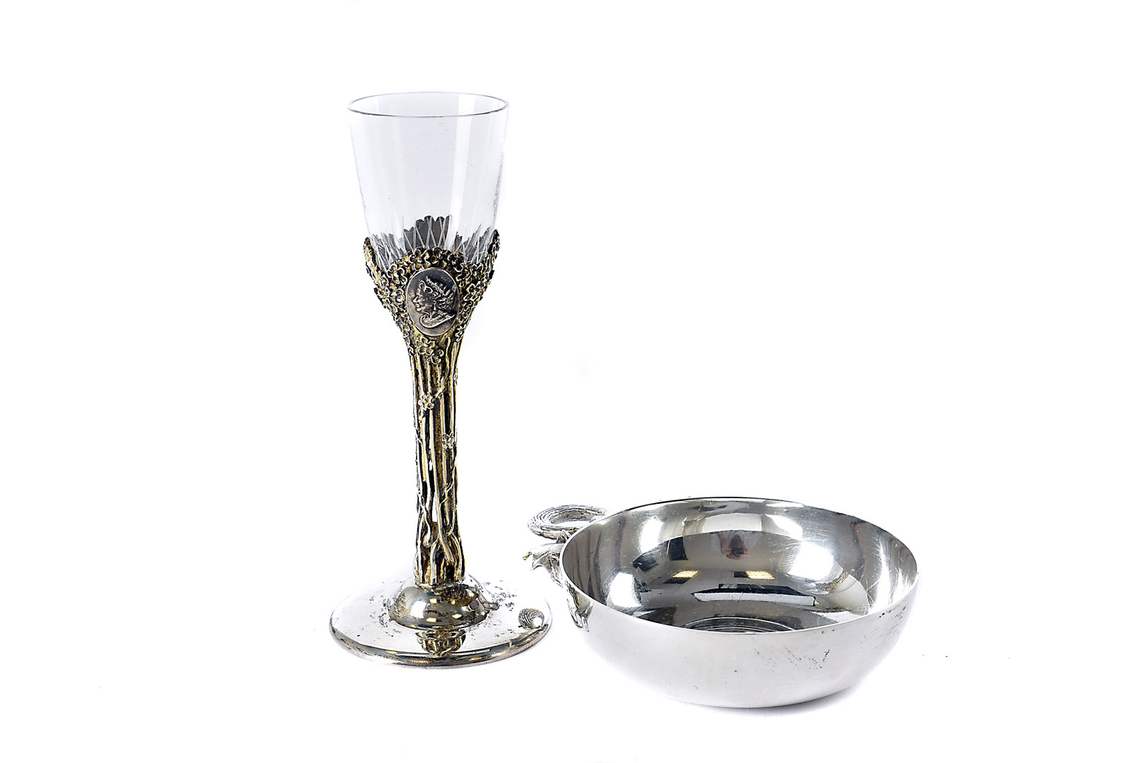 A modern taste du vin by HOL, having holly leaf, berry and ring handle, together with a modern