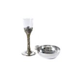 A modern taste du vin by HOL, having holly leaf, berry and ring handle, together with a modern