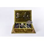 A collection of costume jewellery, including a green velvet box with Saltburn By Sea postcard lid, a