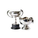 A collection of silver plated RASC related trophies and presentation cups, including a large twin