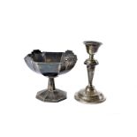 An Art Deco silver comport, together with a silver filled candlestick (2)