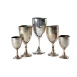 A group of five George V and later trophy goblets, all RASC presentation related, including one