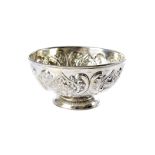 A late Victorian silver footed bowl by William Hutton & Sons, with embossed designs, 6.2 ozt