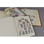 A group of four Africa and related stamp collection albums, predominantly from the 20th century