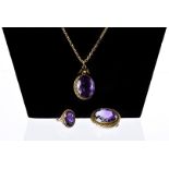 An Edwardian and later associated suite of amethyst jewellery, each with a single purple stone,