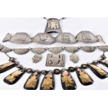 A group of eight Peruvian silver and white metal jewellery items, including two pairs of