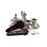 A pair of cased Victorian silver plated grape shears, together with a four piece plated tea set,