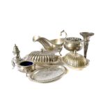 A collection of silver plated items, including a coffee pot, a pair of sugar sifters, a pair of