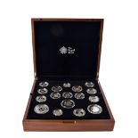 A modern Royal Mint 2016 UK Premium Proof Coin Set, the seventeen uncirculated coins in capsules