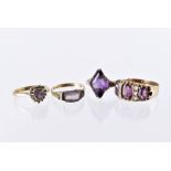 Four 9ct gold and amethyst rings, a three stone and three solitaires, some with clear stones, 10.