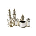 A group of 20th century silver cruet items, including a pair of modern peppers by Gorham, a three