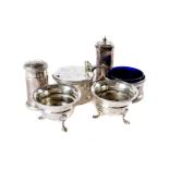 A pair of Edwardian silver trench salts, together with a three piece silver cruet set of salt,