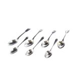 Seven Georgian silver teaspoons, three with raised design to bowls, and four fiddle pattern (7)