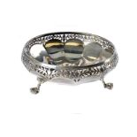 A George V silver dish, on three supports with pierced gallery rim, 11 ozt