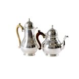 A George V silver teapot and hot water jug by RWB, retailed through Harrods, plain bulbous bodies