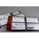 A collection of First Day Covers and Presentation Packs, in ten ring binder albums, FDC's date