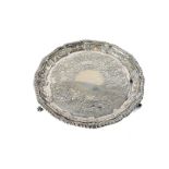 A late Victorian silver card tray by Daniel & John Wellby, with engraved floral designs to well,