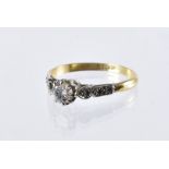 An Art Deco period diamond engagement ring, having a central brilliant cut of approx 0.4ct with