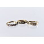 Three 9ct gold and gem set dress rings, all half hoop in style, 5.5g (3)