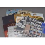A small collection of GB modern stamps, including several Collectors Pack mint stamp sets from the
