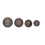 An Edward VII part Maundy money coin set, with 4p, 3p and 2p, dated 1905, together with a 1p from