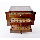 An interesting collection of Ancient to 20th century coins, presented in a Victorian five drawer