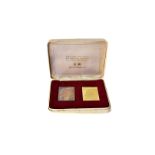 A 1970s gold and silver stamp ingot set, commemorating the Royal Silver Wedding Anniversary in 1972,