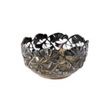 An Art Nouveau period German silver bowl, having pierced leaf and berry design, marked 800,