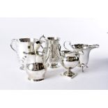 A group of five Victorian and later silver milk and cream jugs, in varying styles, in good