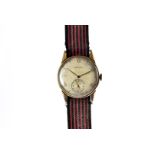 A vintage 9ct gold Longines gentleman's wristwatch, circular dial with baton and Roman numerals
