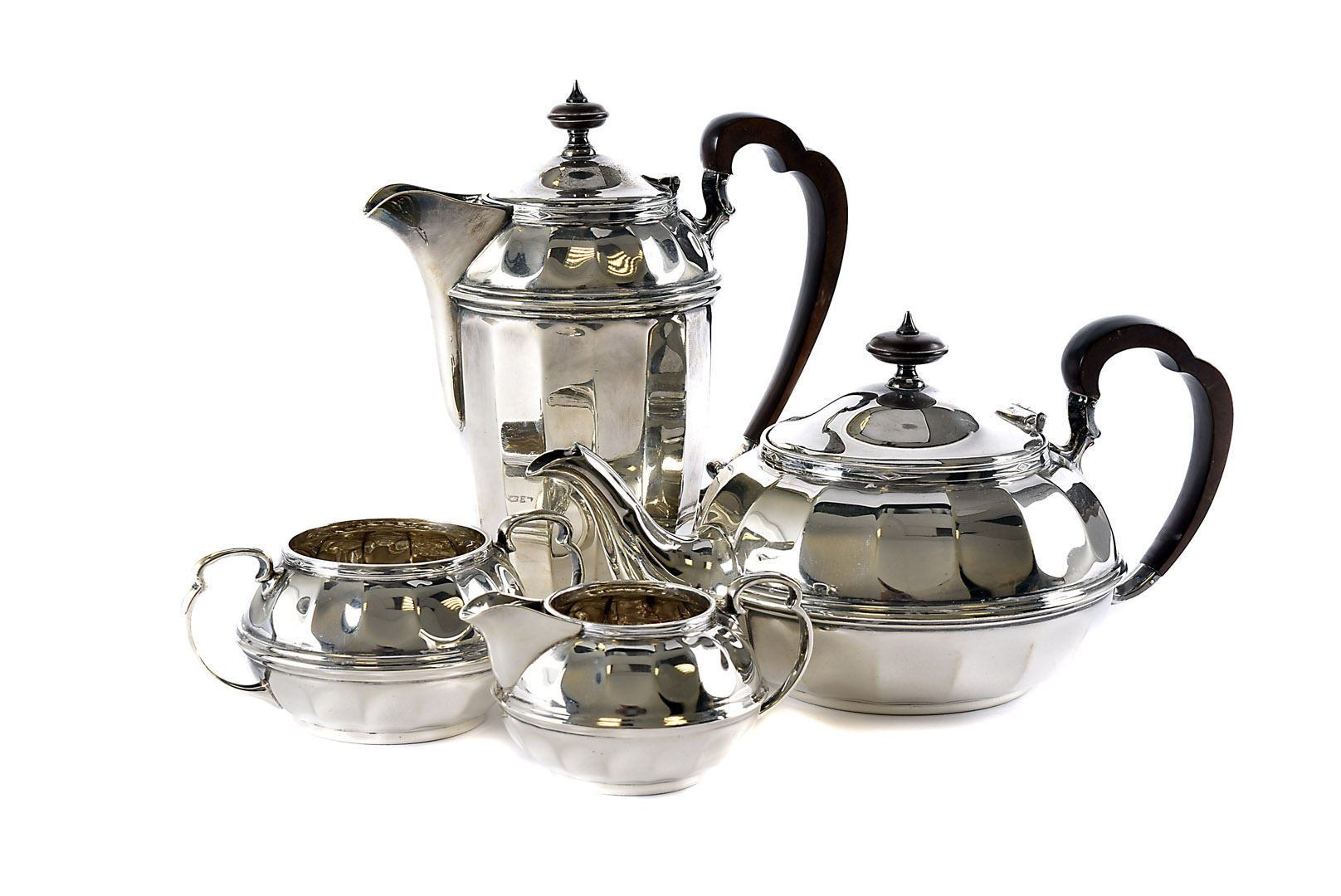 A four piece George V silver tea set, possibly by FC, Sheffield 1929, in the Art Deco style with