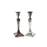A pair of Edwardian silver filled candlesticks by William & Charles Sissons, neo-classical style,