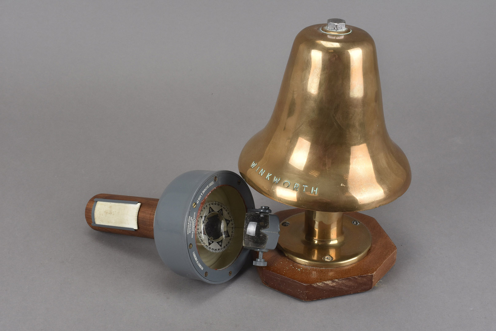 A Winkworth bell, having electrical movement, together with a Henry Browne & Son Ltd hand held