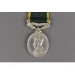 A George V Efficiency medal with Territorial bar, awarded to 6393687 CPL.A.F.WOODCOCK. 5-R SUSS.R.