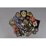 An assortment of military wire badges, comprising Bandmaster, Royal Engineers, Royal Corps of
