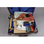 An assortment of Masonic items, mainly for a Suffolk Lodge, including aprons, sashes, jewels, rule