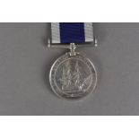 A Victorian Royal Naval Long Service and Good Conduct medal, 1875-77, with narrow suspender, on