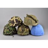 A group of five assorted modern helmets, comprising a British GS Mk6 combat helmet, 1986, a US