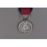 A Waterloo 1815 medal, awarded to NATHANIEL WATTS 2ND BATT. 69TH REG. FOOT, on crimson edged in blue